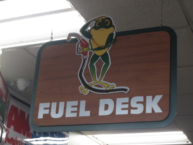 Frog Holding Fuel Pump-Frog City Fuel Desk Sign.jpg