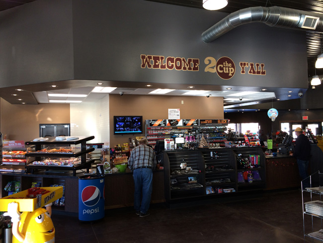 Coffee Cup Moorcroft WY welcome sign-fuel desk.JPG