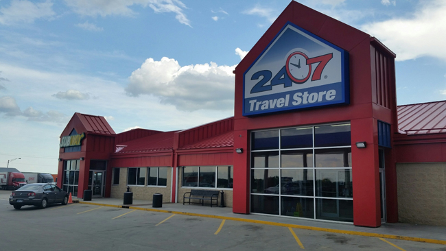 24-7 Maple Hill-TravelStoreSign-TrucksParkedJI.jpg