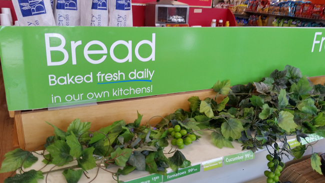 Pride Travel Center-BreadBakedFreshDailySignage-GreeneryJI.jpg