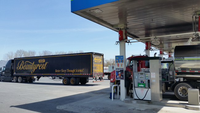 Pride Travel Center-TruckLeaving&TruckFuelingJI.jpg