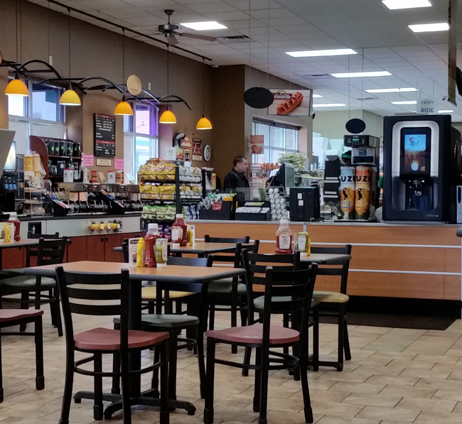 Golden Oil Customer at Counter -Seating AreaJI.jpg